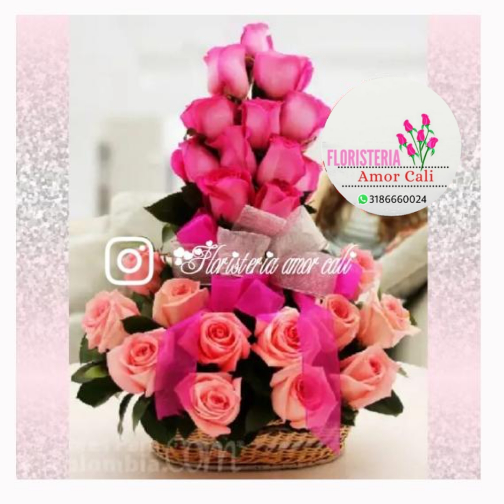 Arreglo floral rosas rosadas y fucsia -